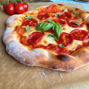 Authentic Italian pizza dough baked with fresh tomatoes and basil