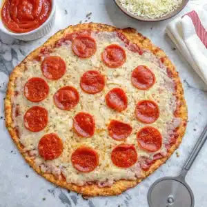 Cottage cheese crust pizza baked with golden edges and melted mozzarella