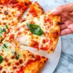 Easy Margherita Pizza served hot and ready to eat with sliced portions