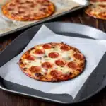 Easy Mini Pizza Recipe That Will Steal the Show at Any Gathering 67 ingredients for easy mini pizza including tortillas, sauce, cheese, and toppings